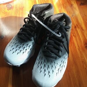 Under Armour Black and White kids cleats with Textured Upper, new